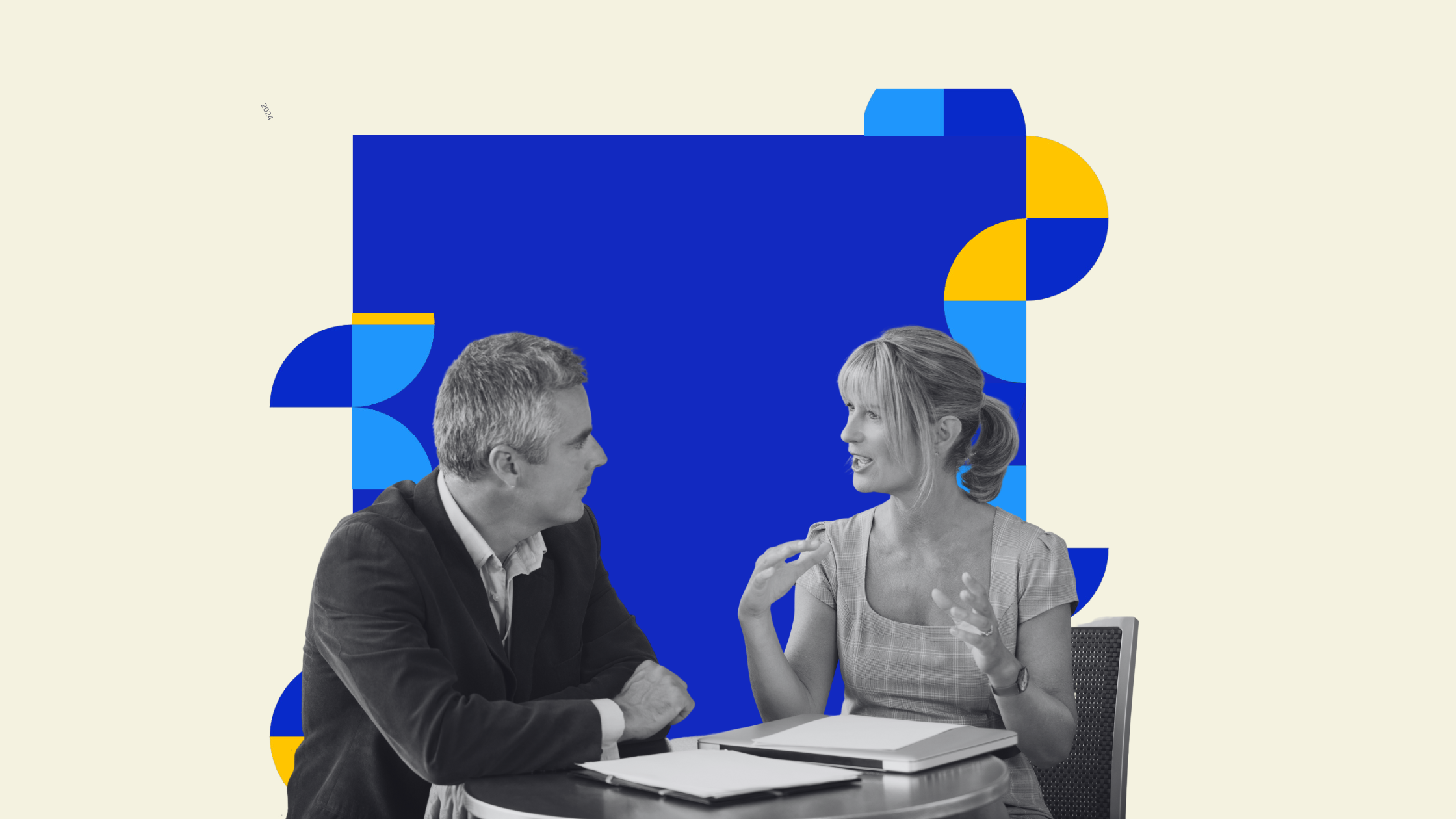 Two people sitting down and talking